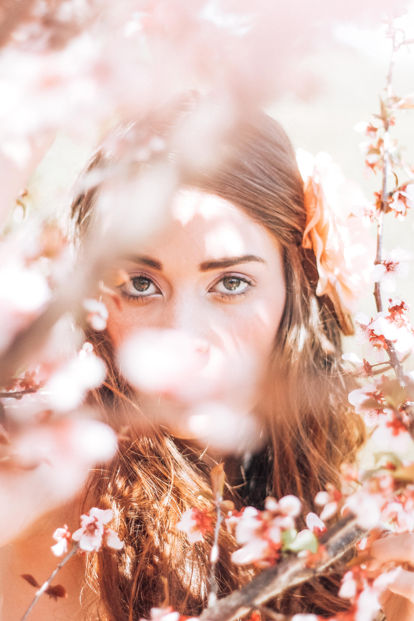 Woman Standing Near Flowers